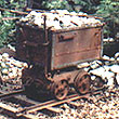 Wildcat Mines of the Mother Lode Logo: mine car loaded with quartz - www.goldrush.com/~kreissb/phil/
